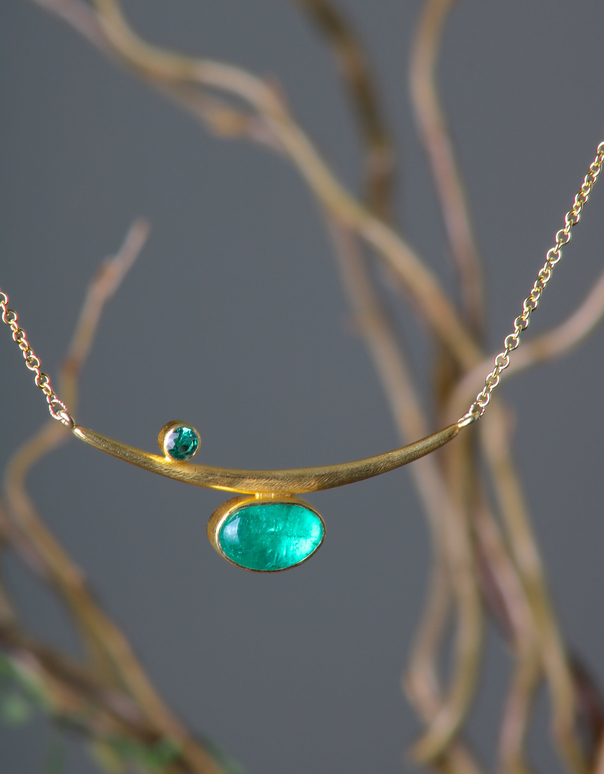 unique design necklace 14K yellow gold with emerald gemstones