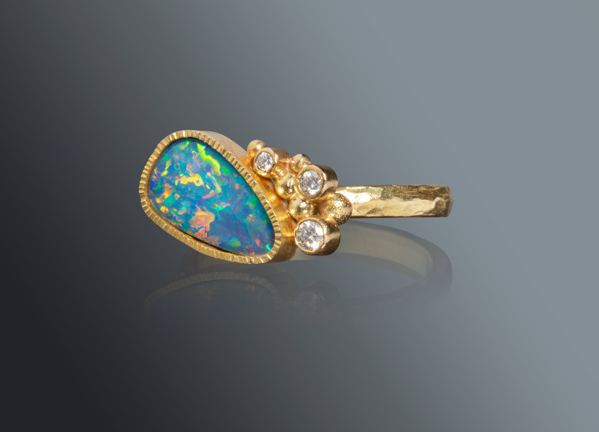 Australian opal ring with diamonds in 14K yellow gold