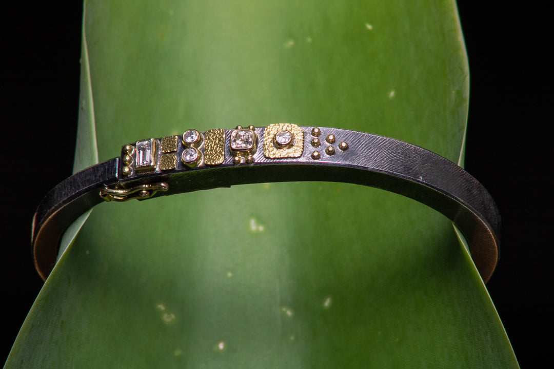 Mixed Metal Clasping Bracelet (B559)